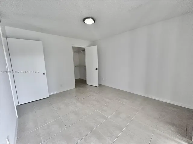 an empty room with a natural light