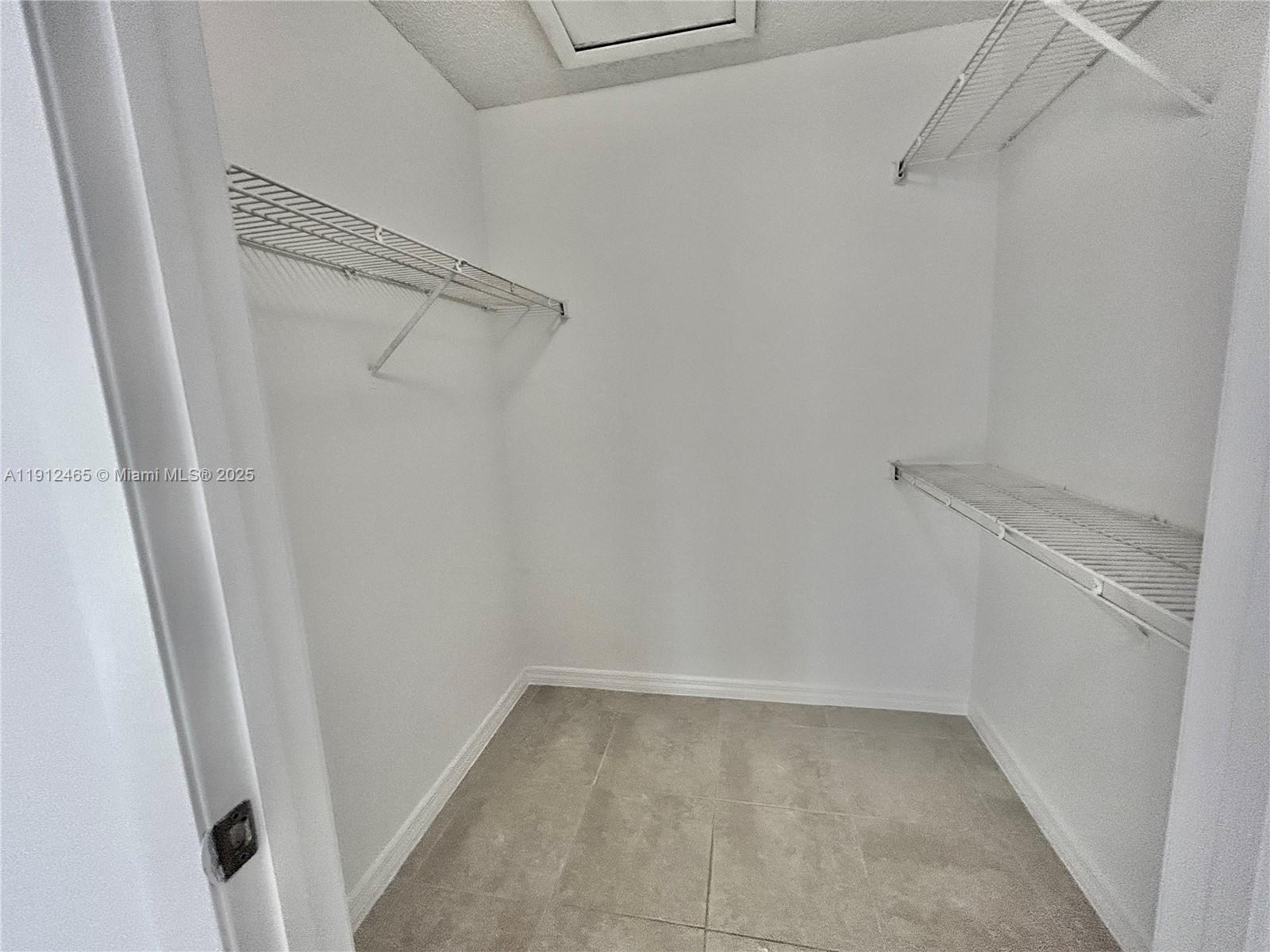 540 South Park Road, Unit 229 Hollywood, FL 33021 - Photo 17 of 44 a view of an empty walk in closet