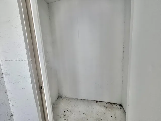 a view of a balcony with wooden floor