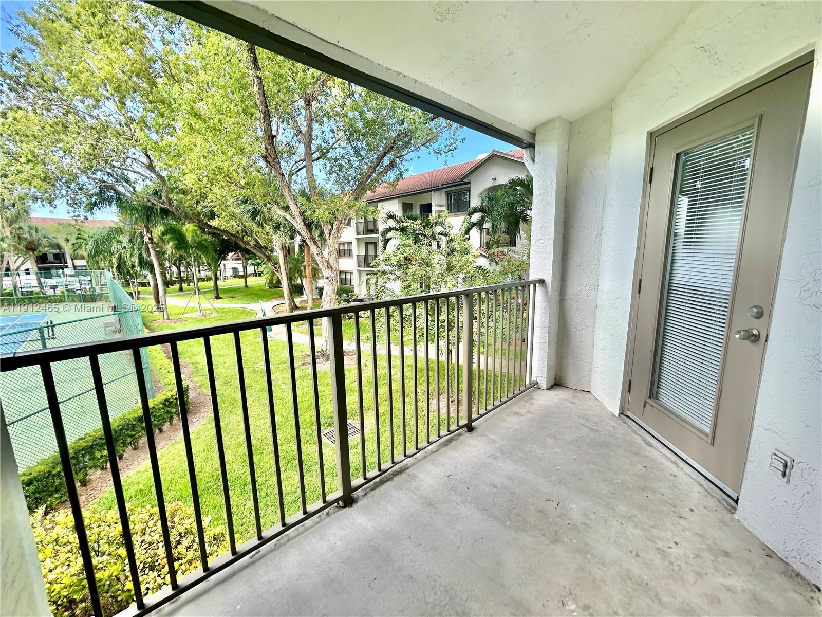 540 South Park Road, Unit 229 Hollywood, FL 33021 - Photo 22 of 44 a view of a balcony with wooden floor