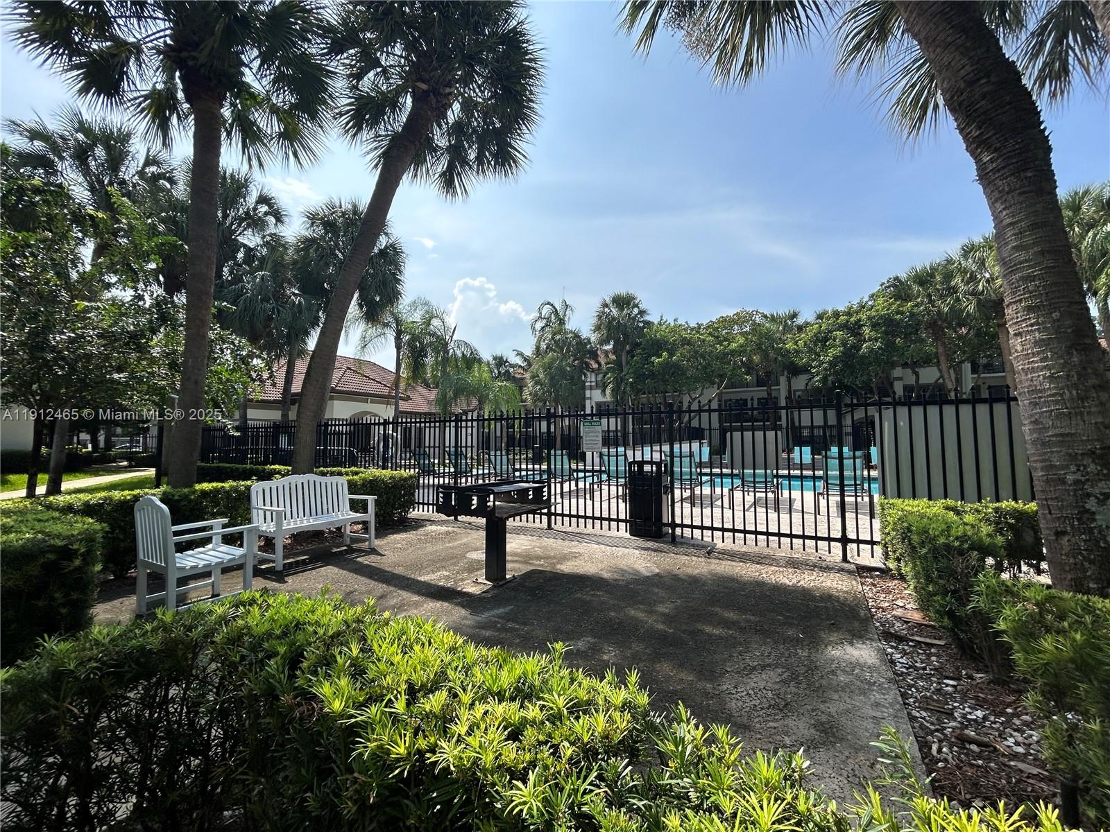 540 South Park Road, Unit 229 Hollywood, FL 33021 - Photo 31 of 44 a view of a park with iron fence