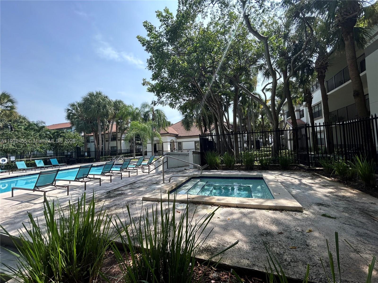 540 South Park Road, Unit 229 Hollywood, FL 33021 - Photo 39 of 44 a view of a swimming pool with a patio