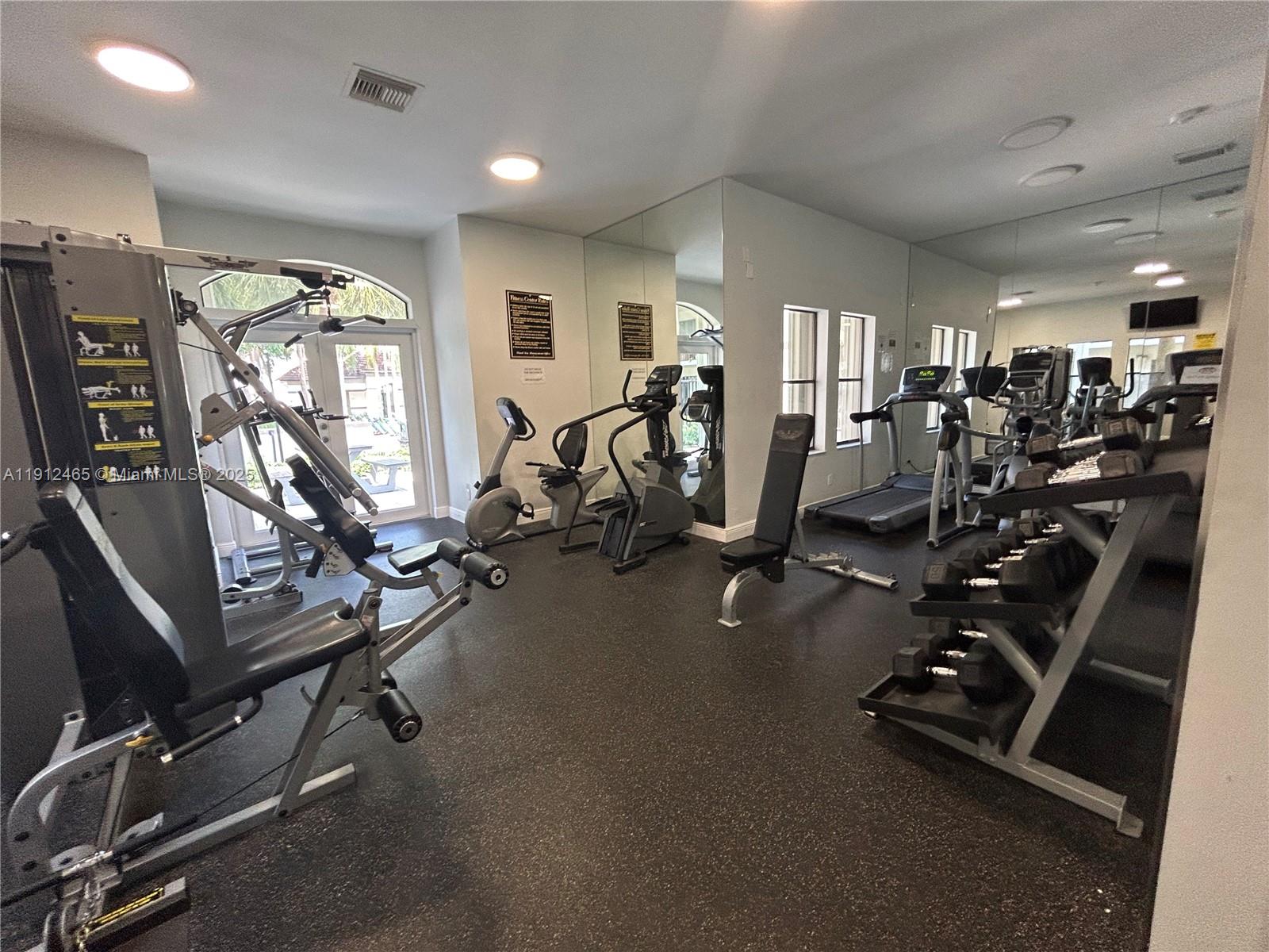 540 South Park Road, Unit 229 Hollywood, FL 33021 - Photo 41 of 44 a view of a room with gym equipment