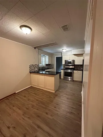 a bathroom with a toilet and a sink