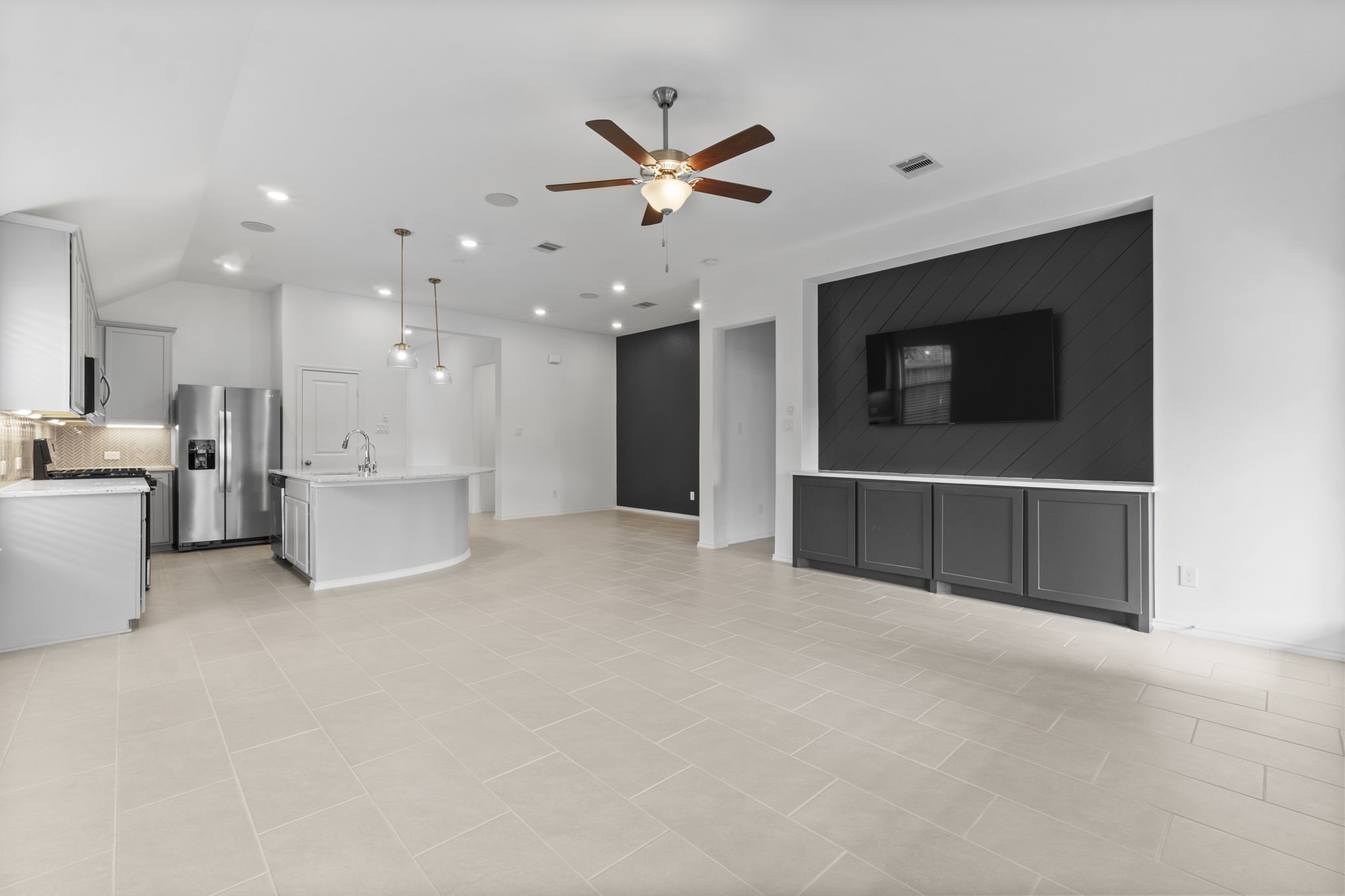 21719 Grayson Highlands Way Porter, TX 77365 - Photo 22 of 42 This is the view of the open space and all the areas flowing between each other