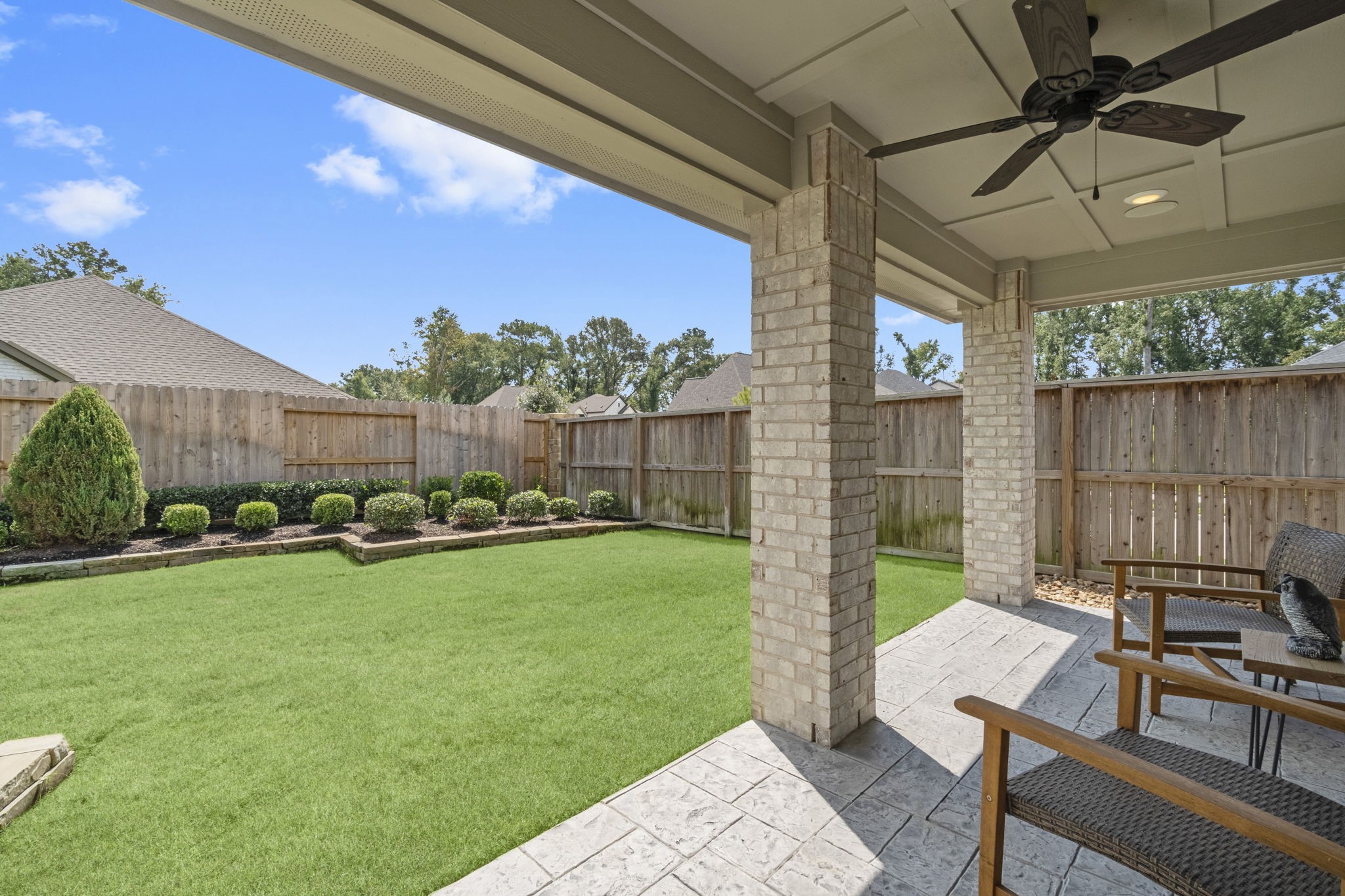 21719 Grayson Highlands Way Porter, TX 77365 - Photo 29 of 42 Being in a corner makes the backyard feel very welcoming and tranquil