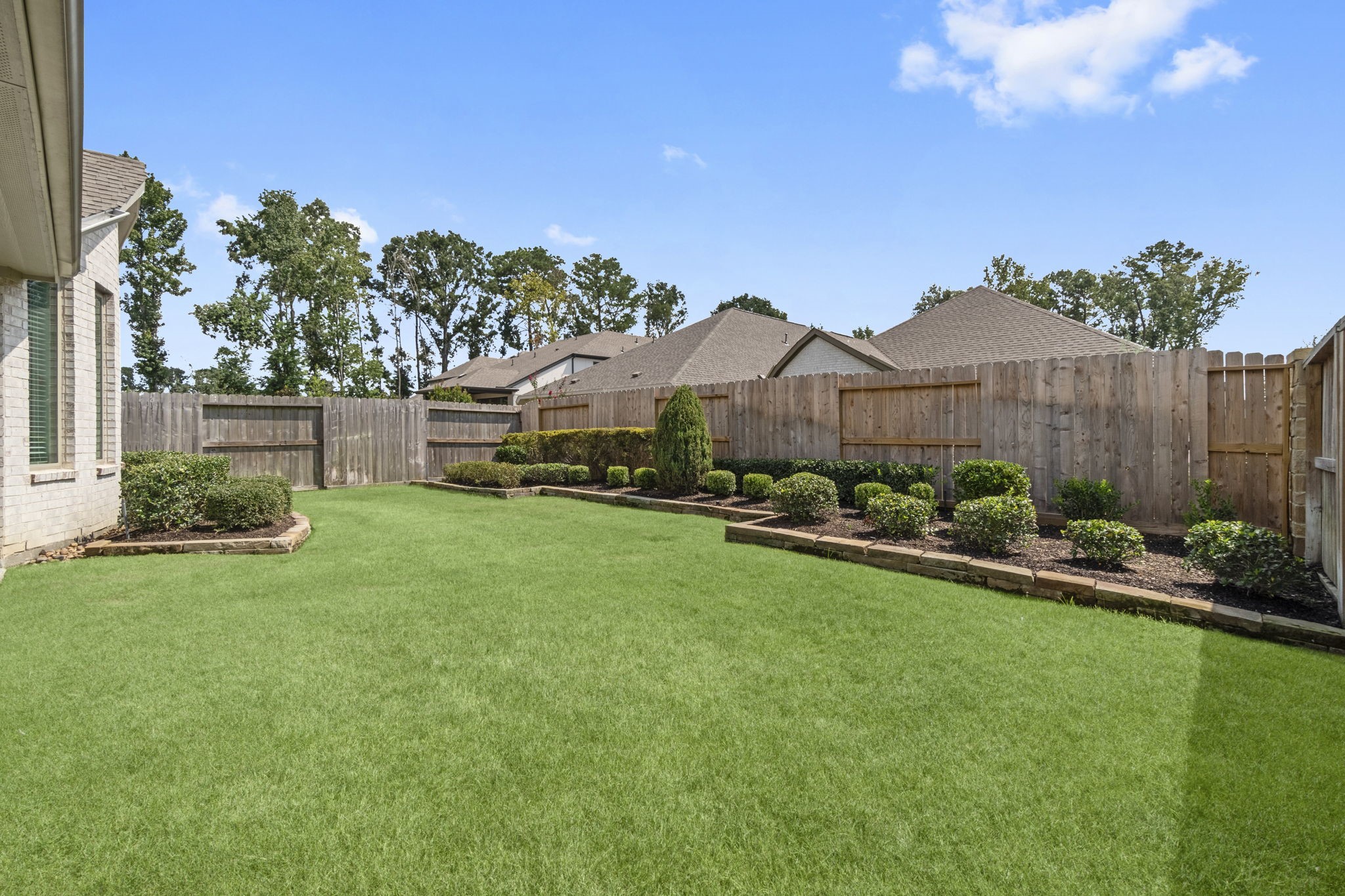 21719 Grayson Highlands Way Porter, TX 77365 - Photo 31 of 42 A great view of the landscape in the backyard
