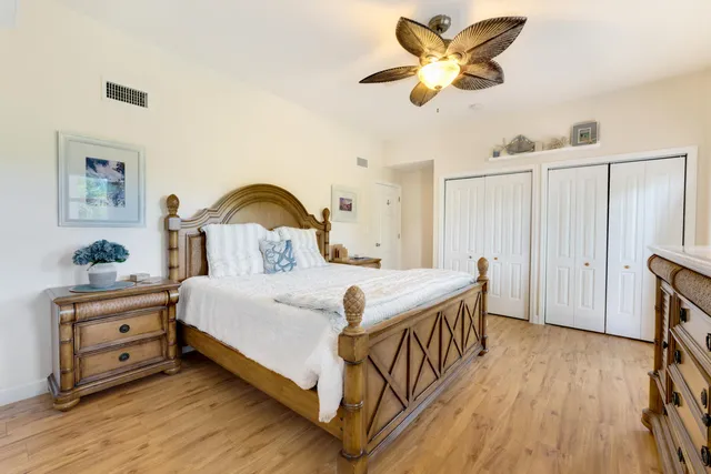 a bathroom with a sink vanity and a mirror