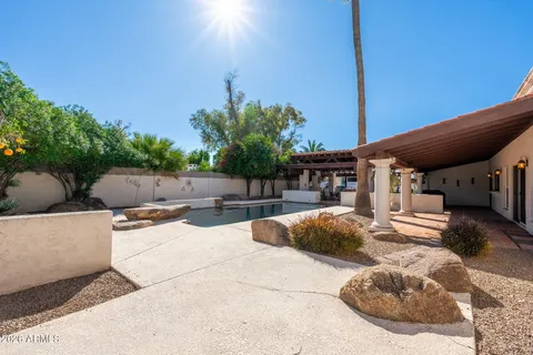 a outdoor space with lots of table and chairs