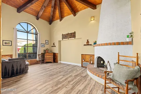 a bedroom with furniture and a window