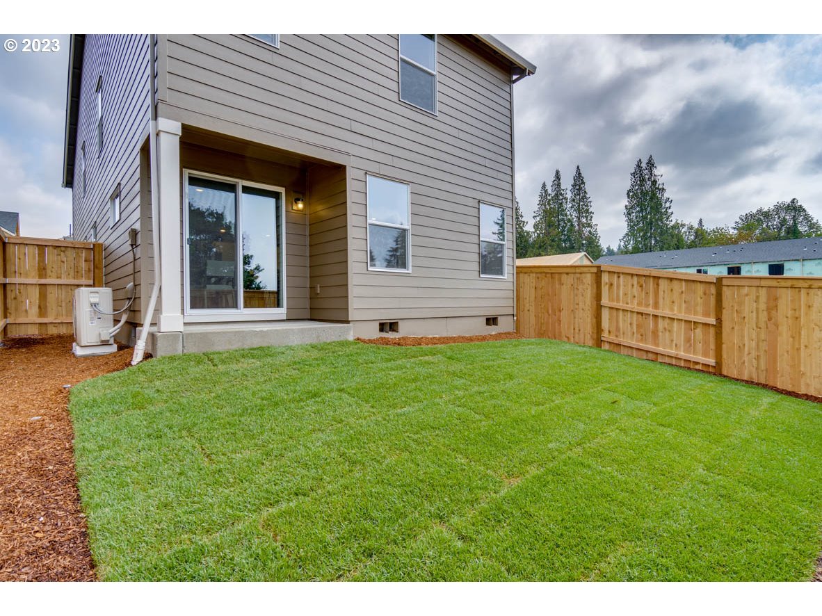 2932 North 3rd Way Ridgefield, WA 98642 - Photo 23 of 26 a view of a house with backyard