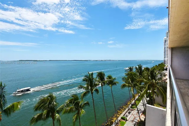 a view of a yard with an ocean view