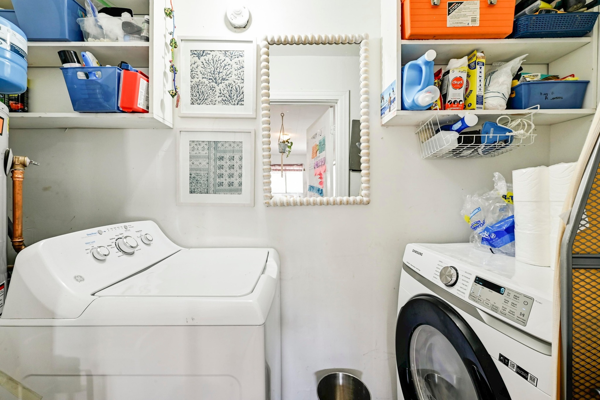4530 Avenue D, Unit B Austin, TX 78751 - Photo 21 of 29 a utility room with dryer washer and a fridge