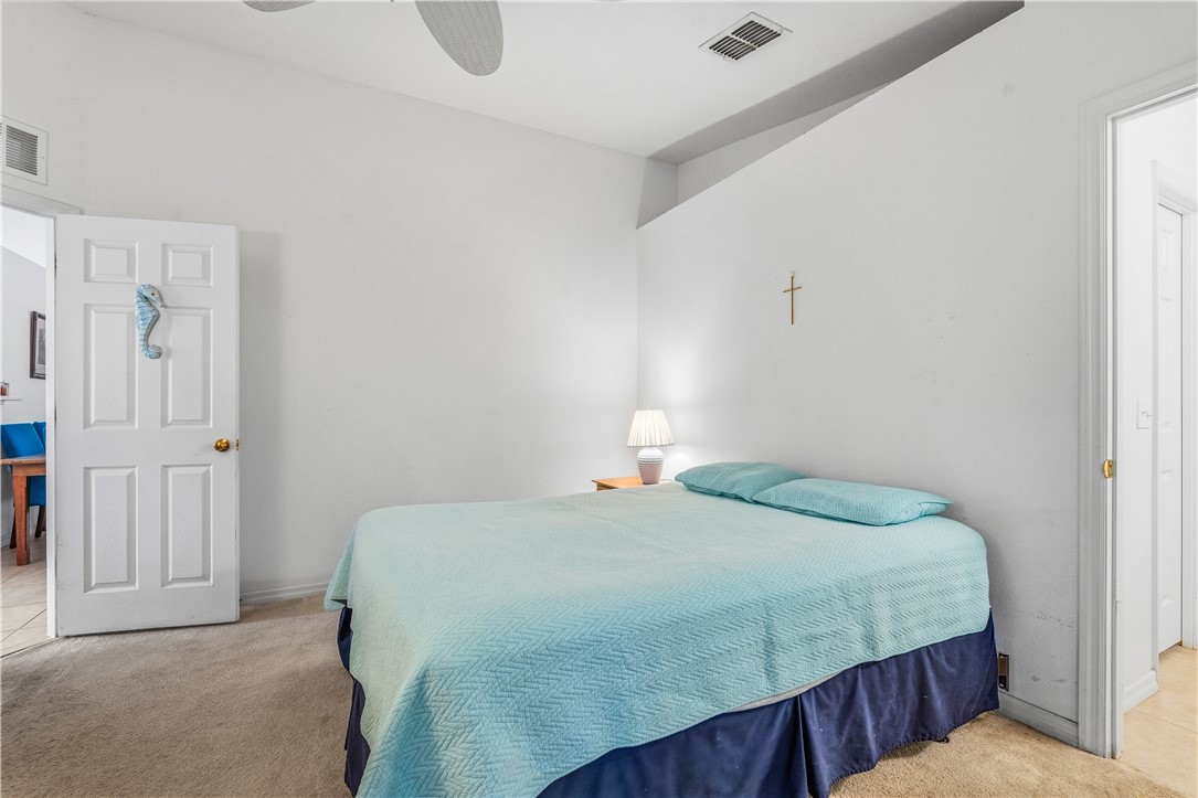 131 Bellamy Trail Sebastian, FL 32958 - Photo 18 of 32 a bedroom with a bed and walk in closet