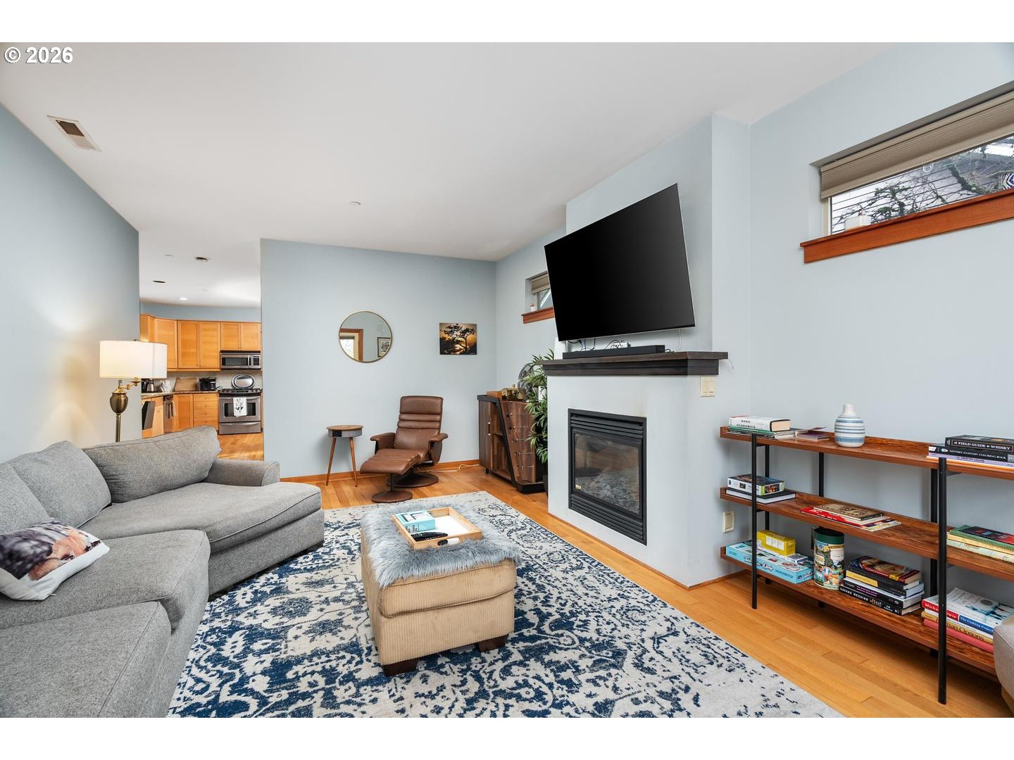 5047 Southwest View Point Terrace, Unit C Portland, OR 97239 - Photo 15 of 38 a living room with furniture and a flat screen tv