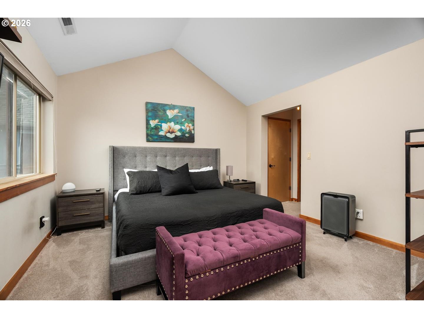 5047 Southwest View Point Terrace, Unit C Portland, OR 97239 - Photo 21 of 38 a bedroom with furniture and a couch