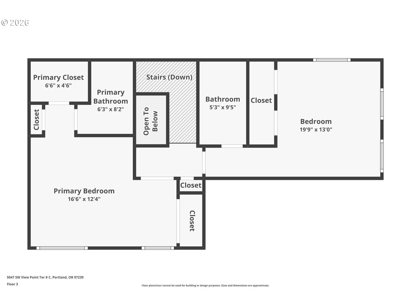 5047 Southwest View Point Terrace, Unit C Portland, OR 97239 - Photo 38 of 38 a picture of a book and a bed