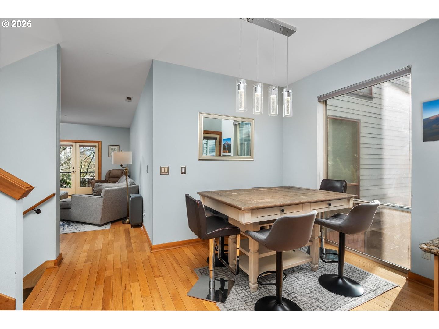 5047 Southwest View Point Terrace, Unit C Portland, OR 97239 - Photo 6 of 38 a view of a dining room with furniture and wooden floor
