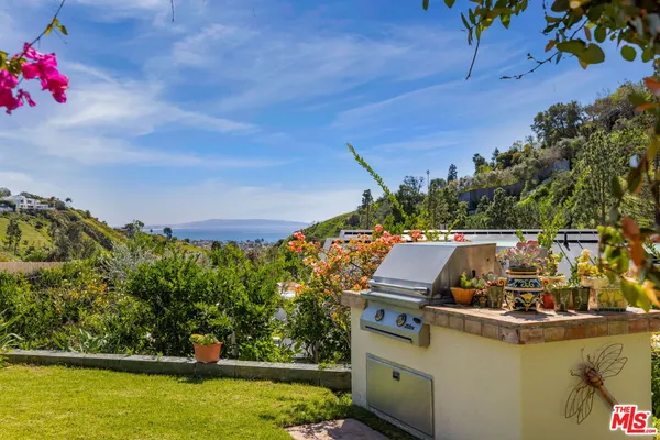 a view of a house with a ocean view
