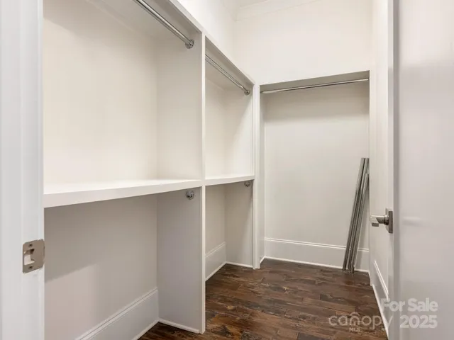 a view of an empty walk in closet