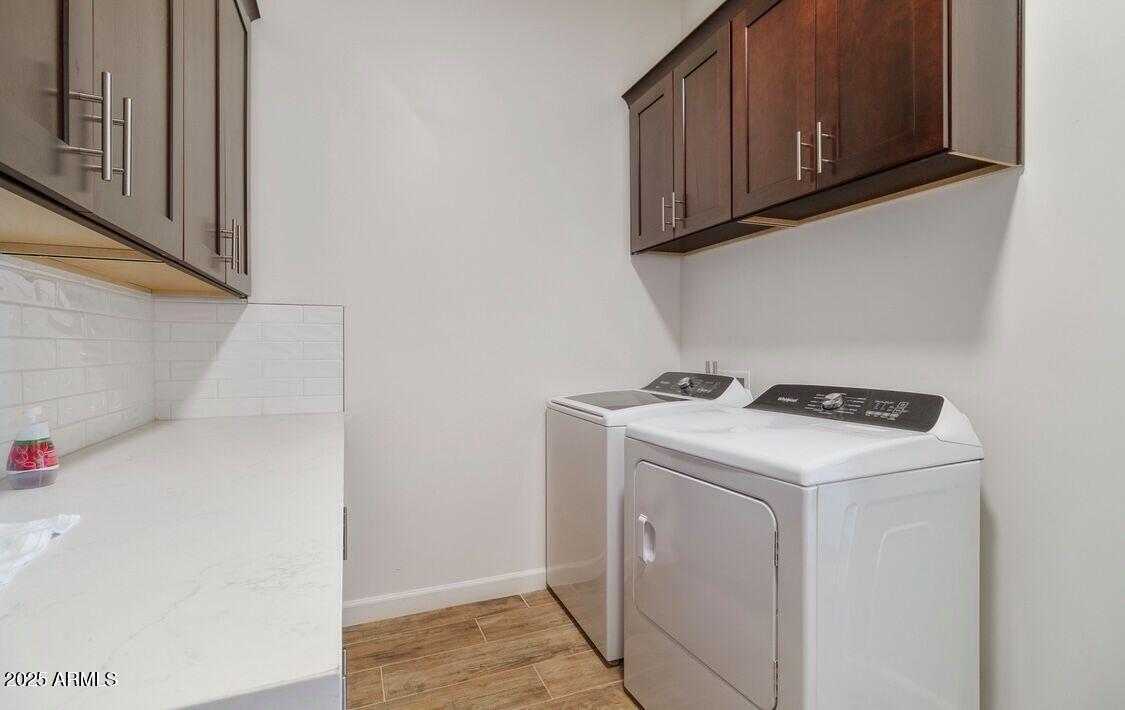 48126 North Coyote Pass Road New River, AZ 85087 - Photo 11 of 23 a utility room with dryer and washer