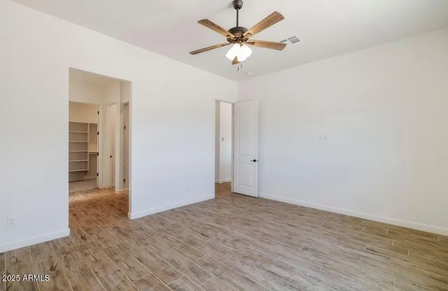 a view of an empty walk in closet