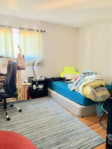 a room with furniture and a window