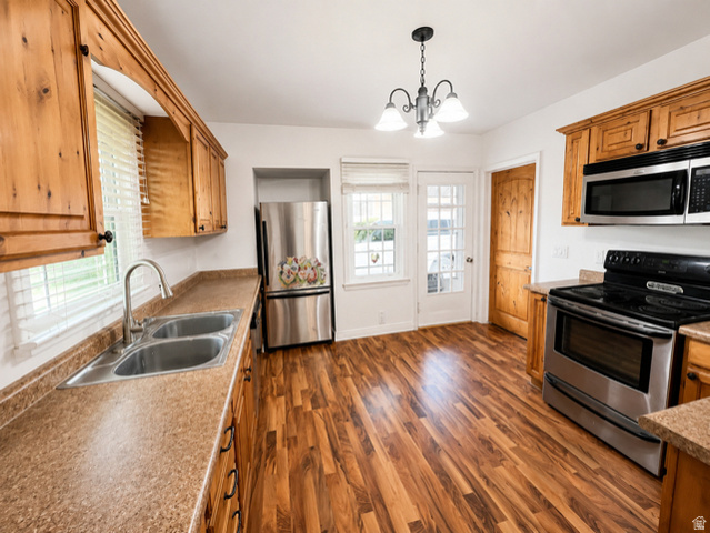 1766 Kenilworth Road Spring Glen, UT 84526 - Photo 3 of 24 Kitchen featuring wood-finish flooring and natural wood cabinetry