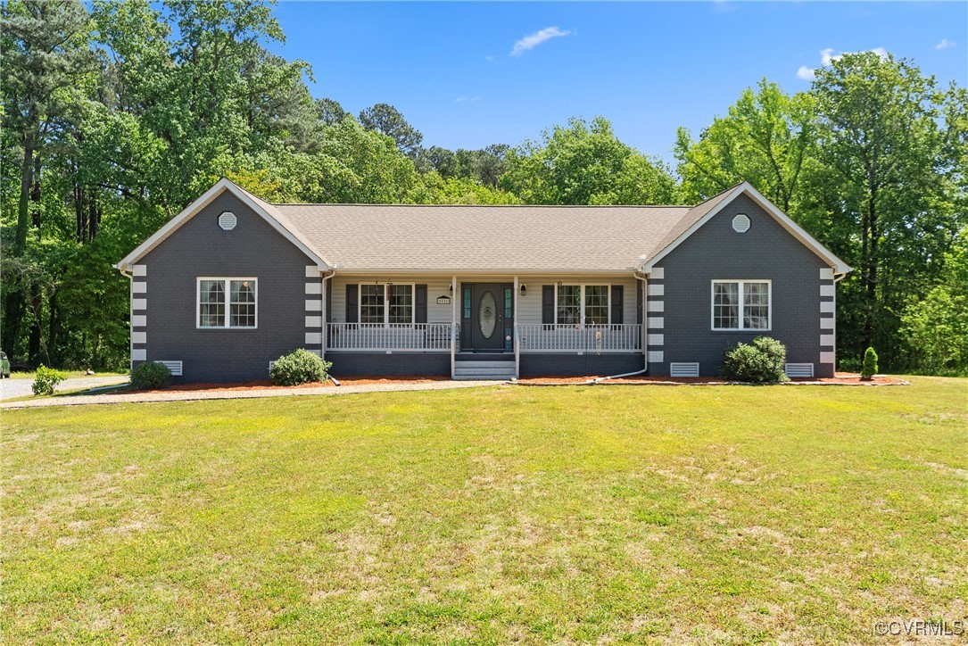 5026 Water View Road Water View, VA 23180 - Photo 1 of 50 Ranch-style home with covered porch, a front lawn,
