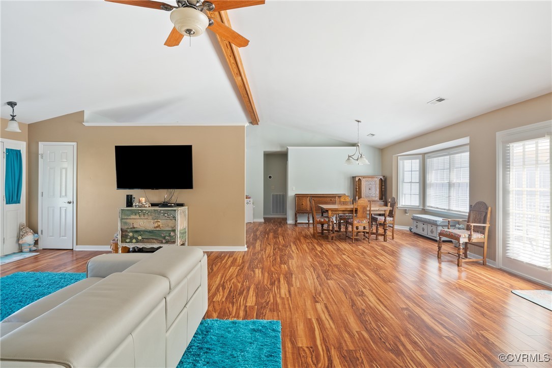 5026 Water View Road Water View, VA 23180 - Photo 12 of 50 Living area featuring visible vents, wood finished