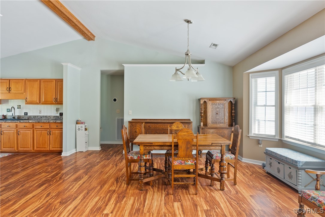 5026 Water View Road Water View, VA 23180 - Photo 14 of 50 Dining room with visible vents, beamed ceiling, ba