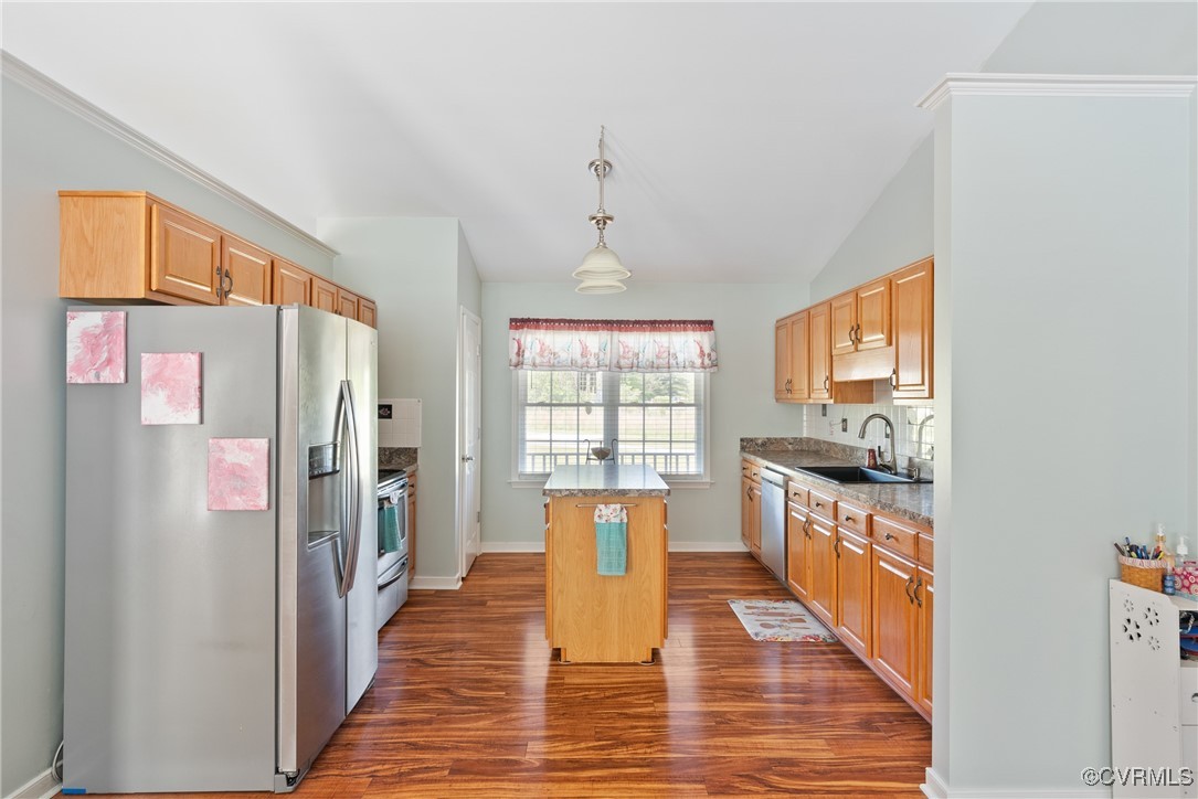 5026 Water View Road Water View, VA 23180 - Photo 18 of 50 Kitchen with lofted ceiling, a kitchen island, dar