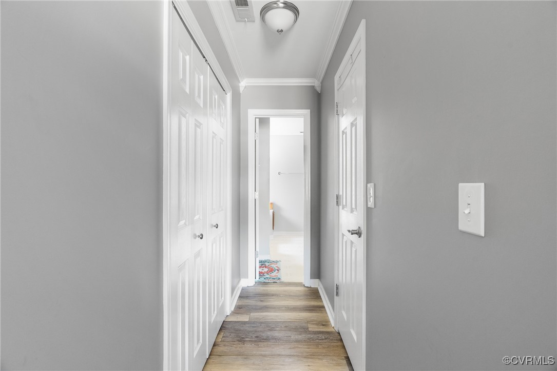 5026 Water View Road Water View, VA 23180 - Photo 25 of 50 Corridor with crown molding, baseboards, visible v