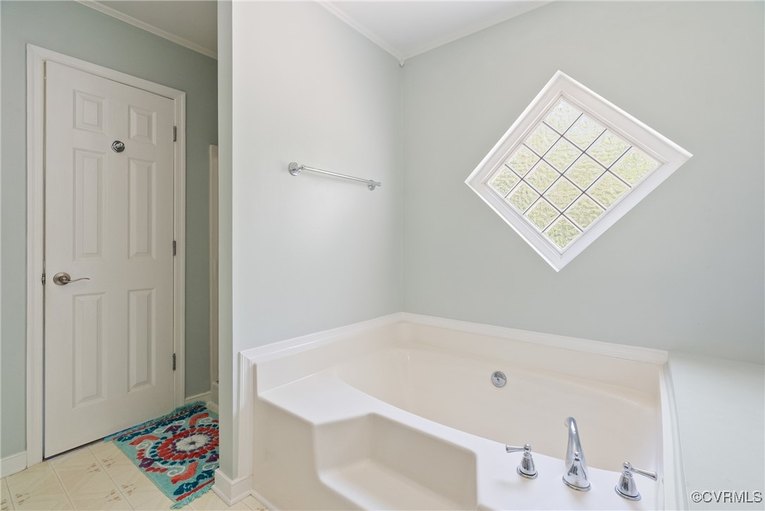 5026 Water View Road Water View, VA 23180 - Photo 29 of 50 Bathroom featuring crown molding, baseboards, and