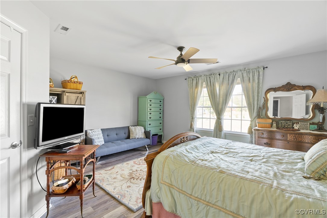 5026 Water View Road Water View, VA 23180 - Photo 31 of 50 Bedroom with ceiling fan, wood finished floors, an
