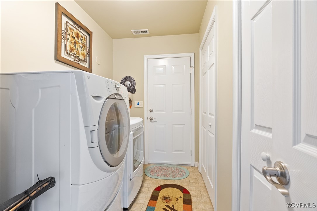 5026 Water View Road Water View, VA 23180 - Photo 35 of 50 Clothes washing area featuring baseboards, laundry