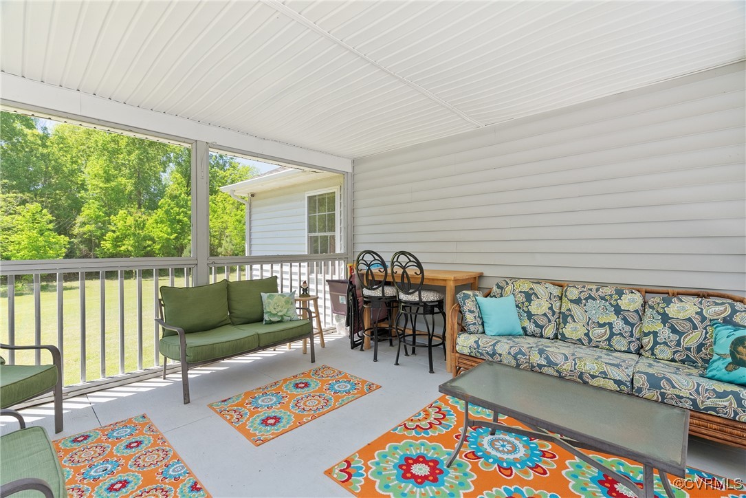 5026 Water View Road Water View, VA 23180 - Photo 36 of 50 Sunroom featuring outdoor lounge area