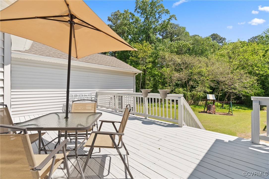 5026 Water View Road Water View, VA 23180 - Photo 40 of 50 Deck featuring a lawn and outdoor dining space