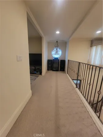 a view of a livingroom with a furniture and a flat screen tv