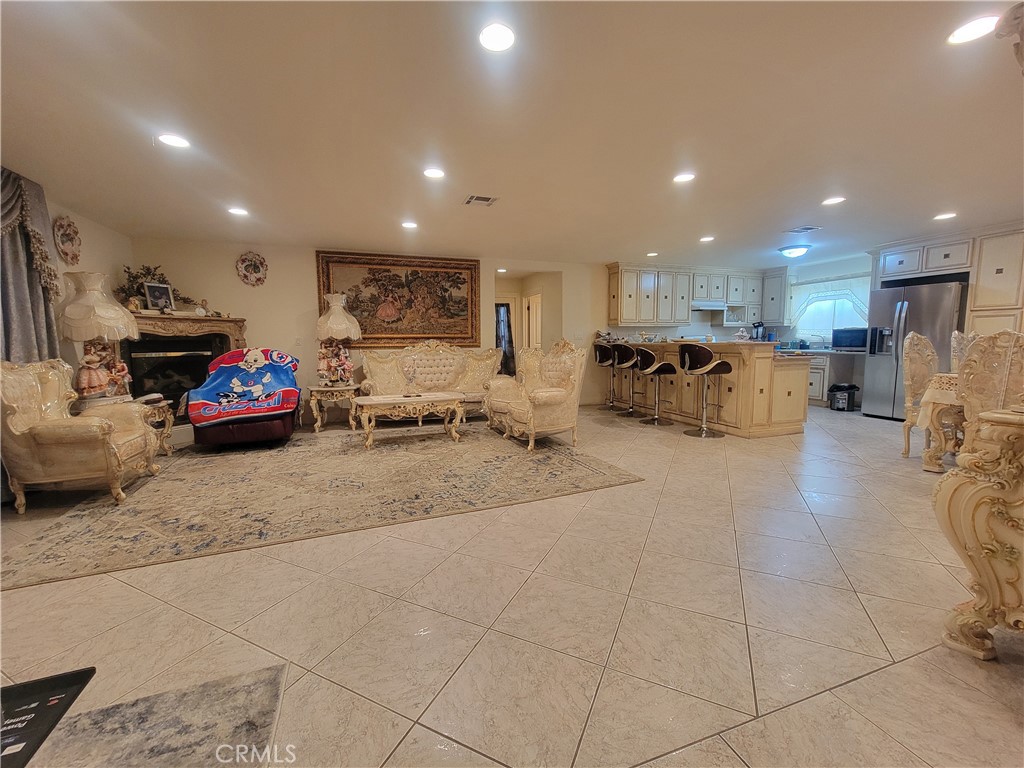 8009 Rose Street Paramount, CA 90723 - Photo 10 of 18 a lobby with furniture and a large window