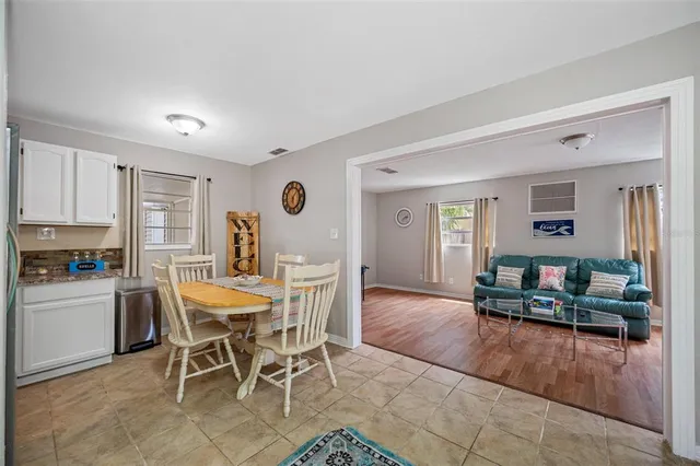 a view of livingroom with hardwood floor and a ceiling fan