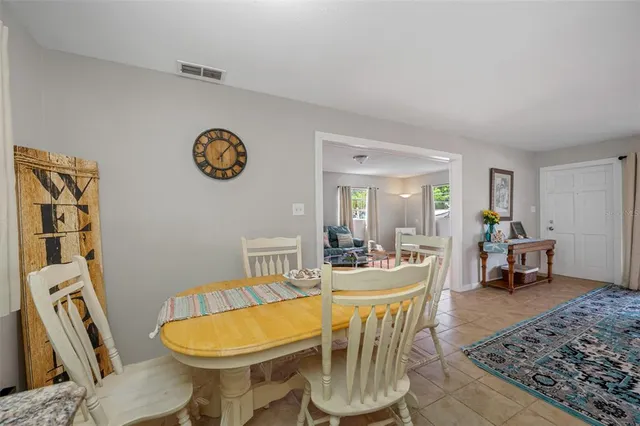 a view of a room with wooden floor and shoes