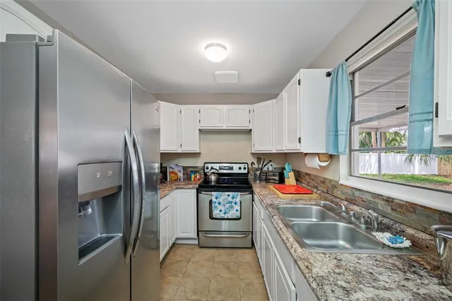 a bedroom with a bed and a table in it