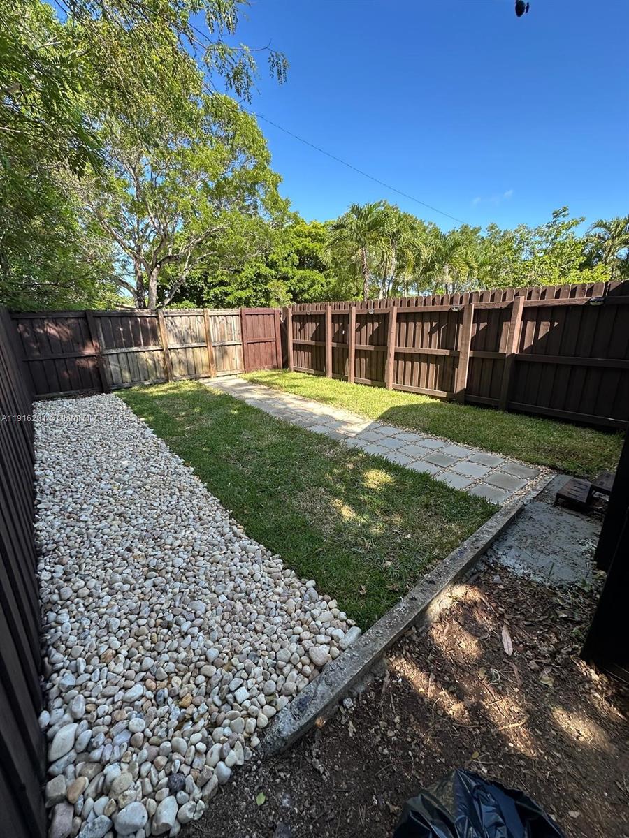 a view of a backyard with a garden