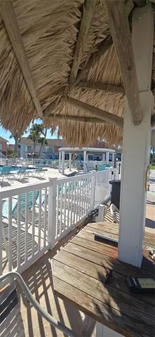a view of a balcony with an ocean view