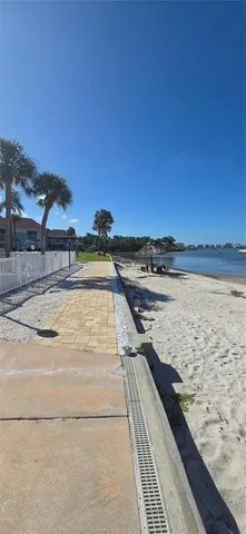 a view of a chairs and table in the patio