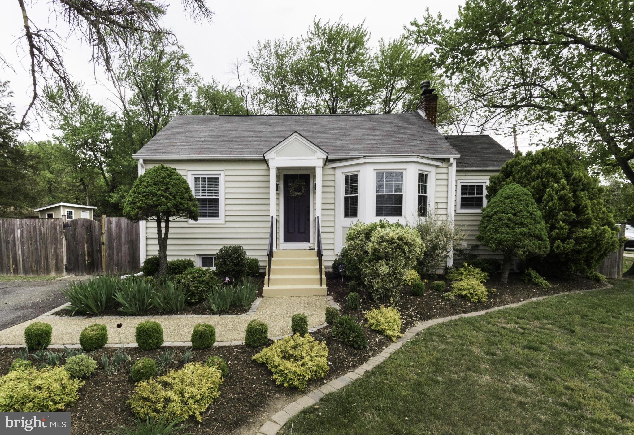 6600 Pine Road Alexandria, VA 22312 - Photo 1 of 28 a front view of a house with a yard