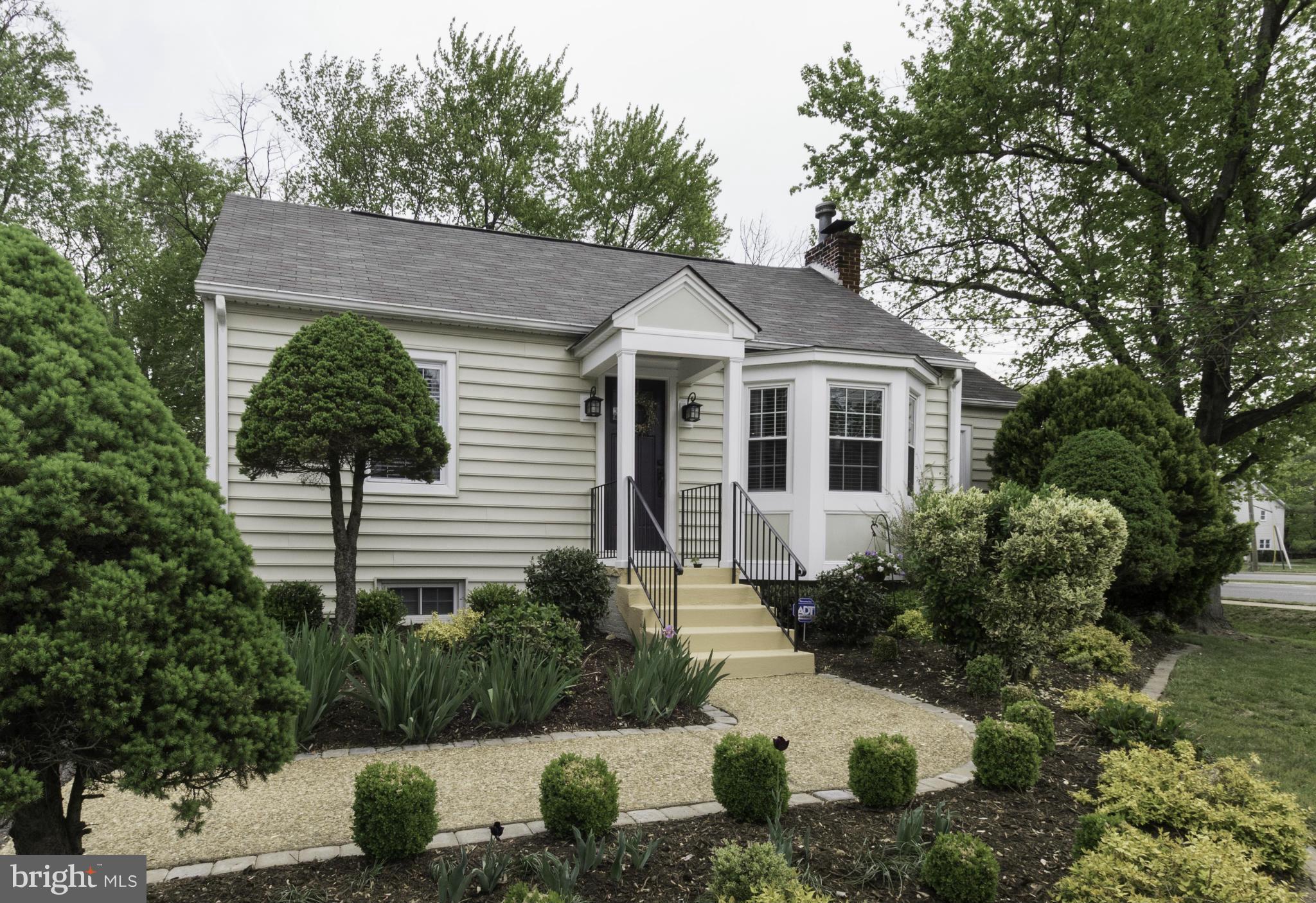 6600 Pine Road Alexandria, VA 22312 - Photo 2 of 28 a front view of a house with a yard