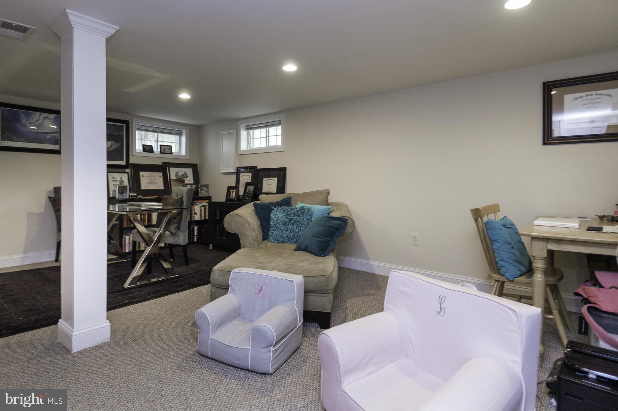 6600 Pine Road Alexandria, VA 22312 - Photo 23 of 28 a living room with furniture and wooden floor