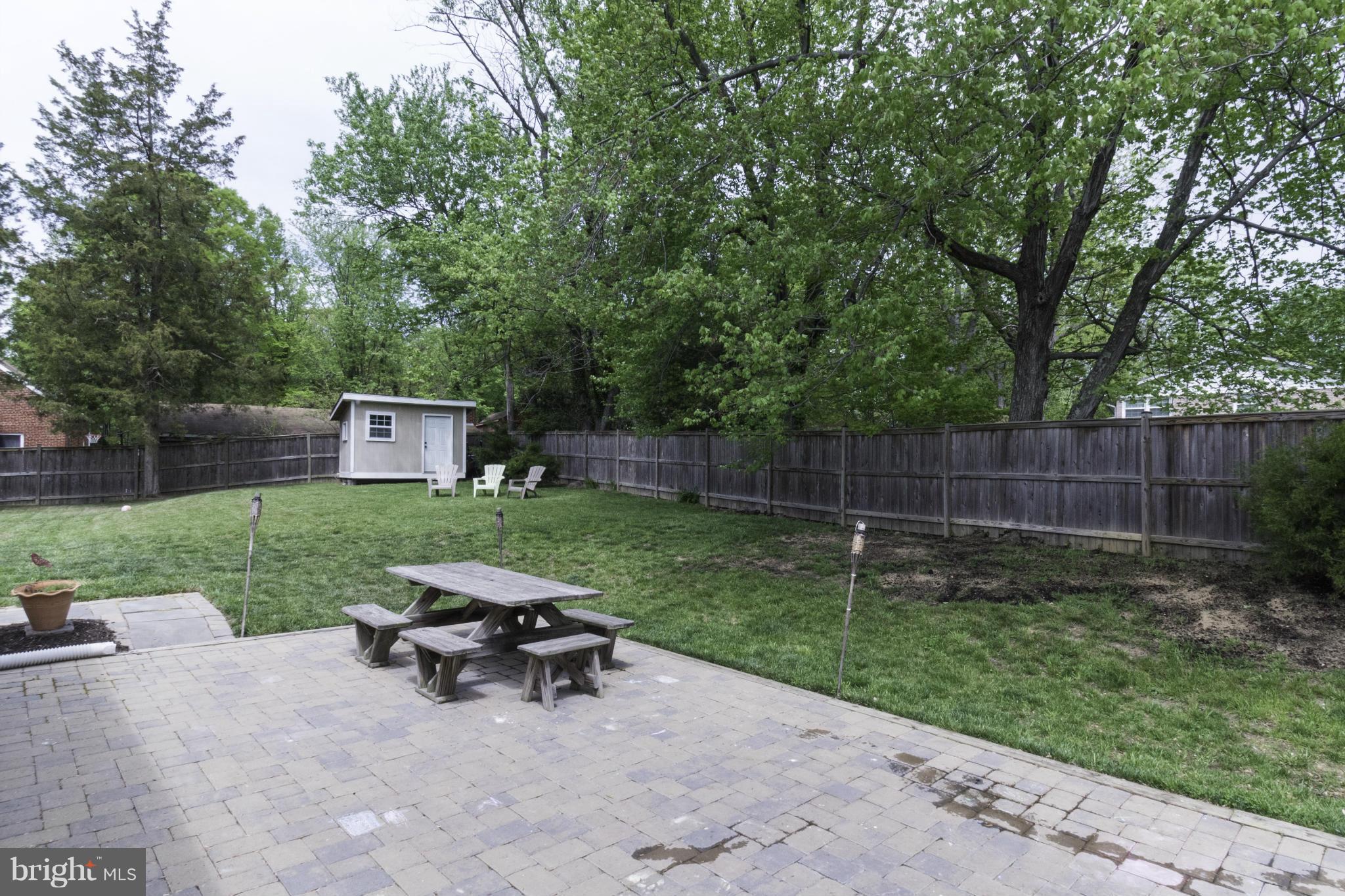 6600 Pine Road Alexandria, VA 22312 - Photo 26 of 28 a view of a backyard with plants and garden